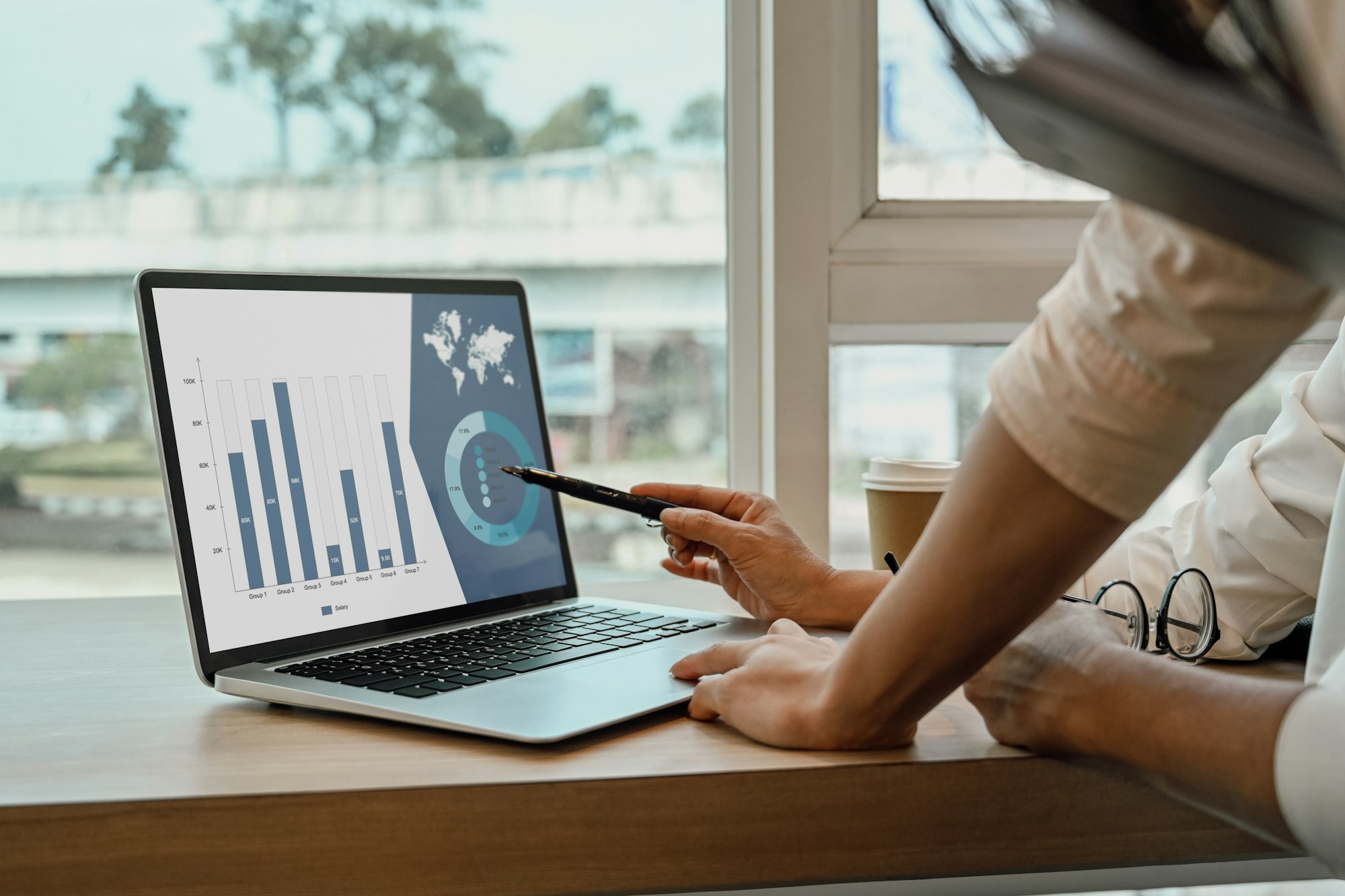 Professional business team analyzing marketing data and financial results at meeting